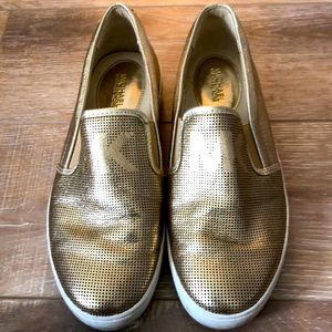 Michael Kors gold leather slip on sneakers